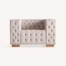 Fauteuil beige capitonné en lin design