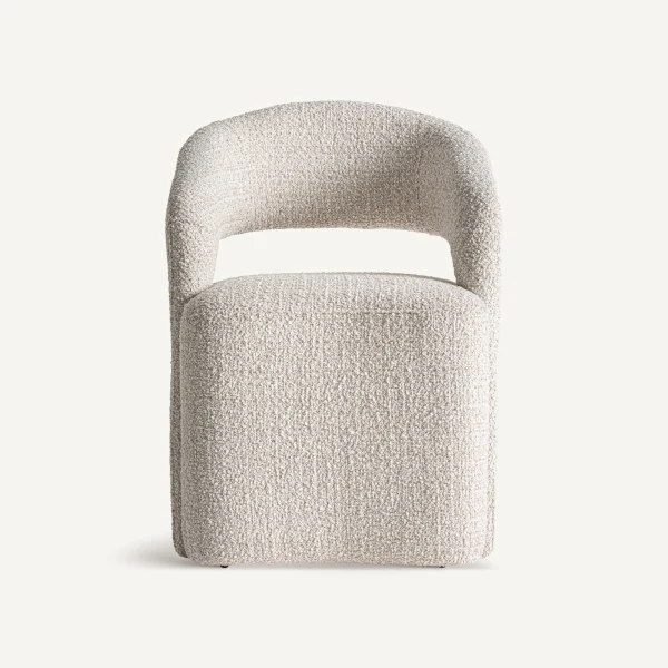 Chaise beige design en tissu bouclé